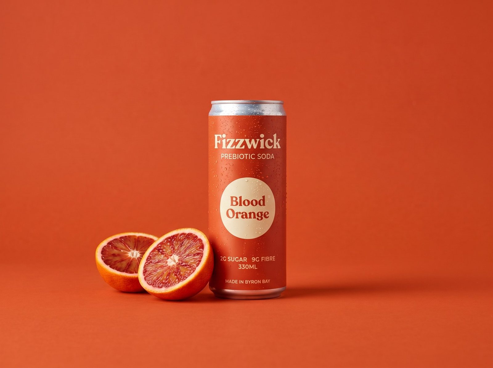 Fizzwick Blood Orange cans with sliced blood orange